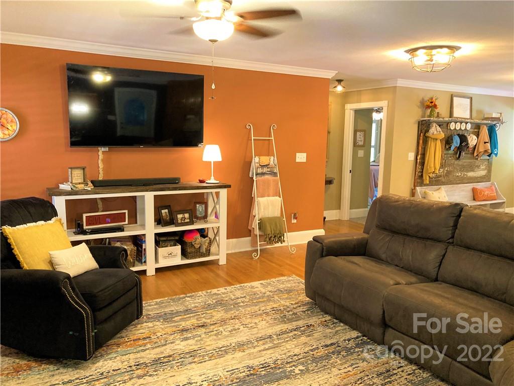 1258 South Mountain Road Bostic, NC 28018 - Photo 3 of 48 a living room with furniture and a flat screen tv