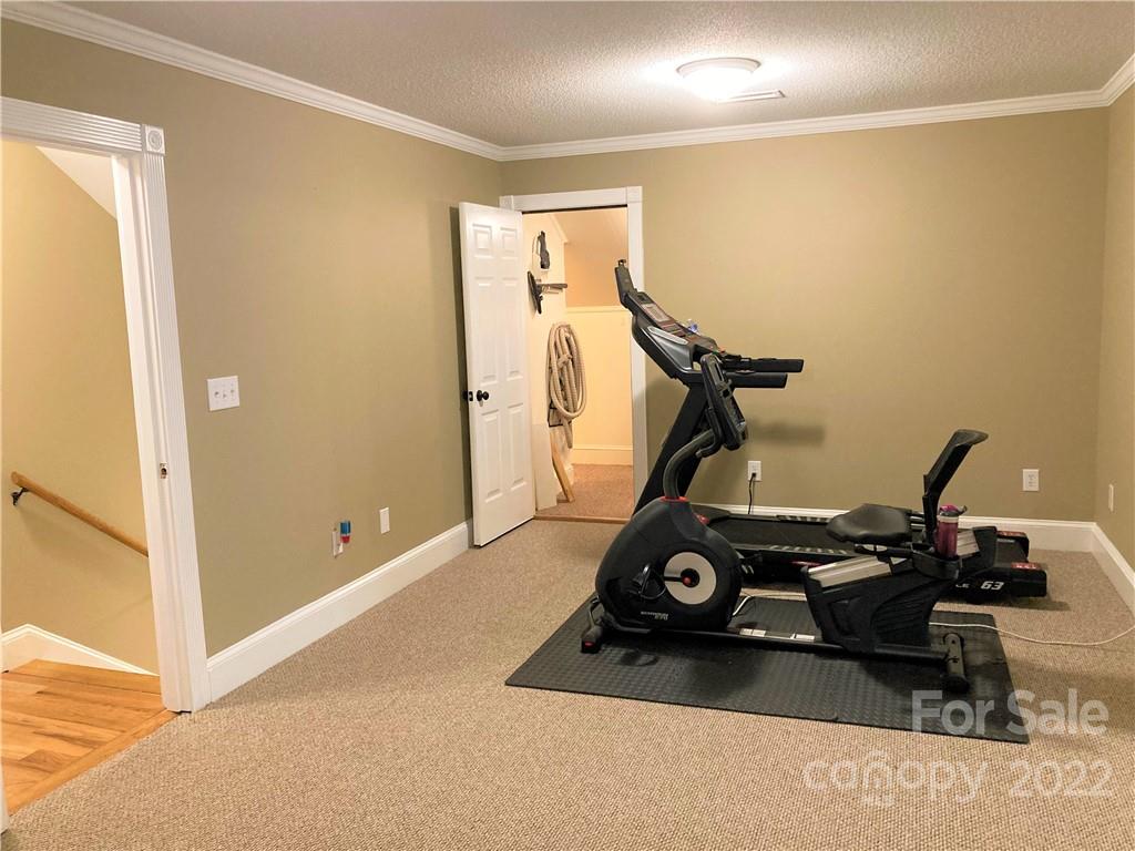 1258 South Mountain Road Bostic, NC 28018 - Photo 32 of 48 a room with gym equipment