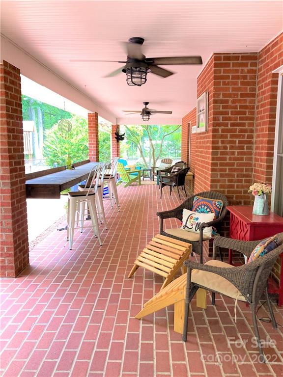 1258 South Mountain Road Bostic, NC 28018 - Photo 41 of 48 a view of a patio with a table and chairs