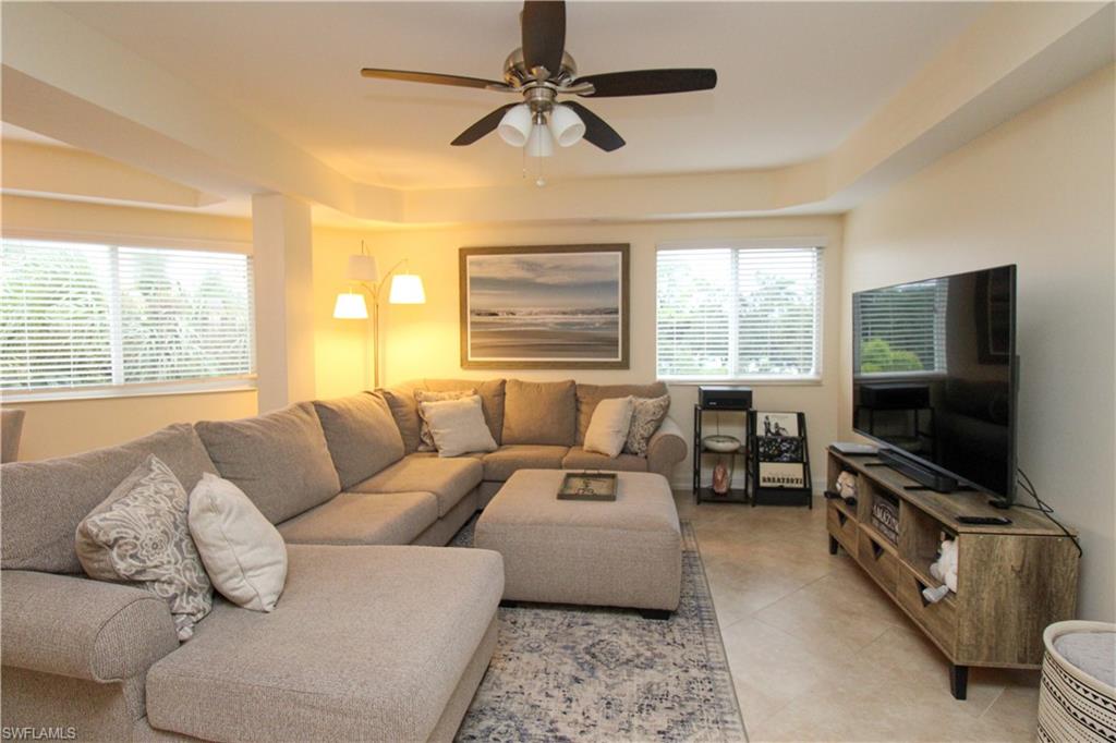1100 Pine Ridge Road, Unit 301B Naples, FL 34108 - Photo 14 of 32 Living room featuring ceiling fan