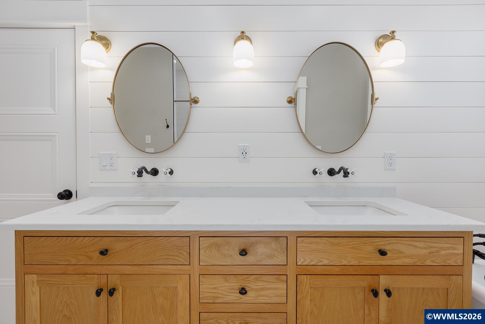 34370 Hawk Hill Road Philomath, OR 97370 - Photo 27 of 50 a bathroom with a sink and a mirror