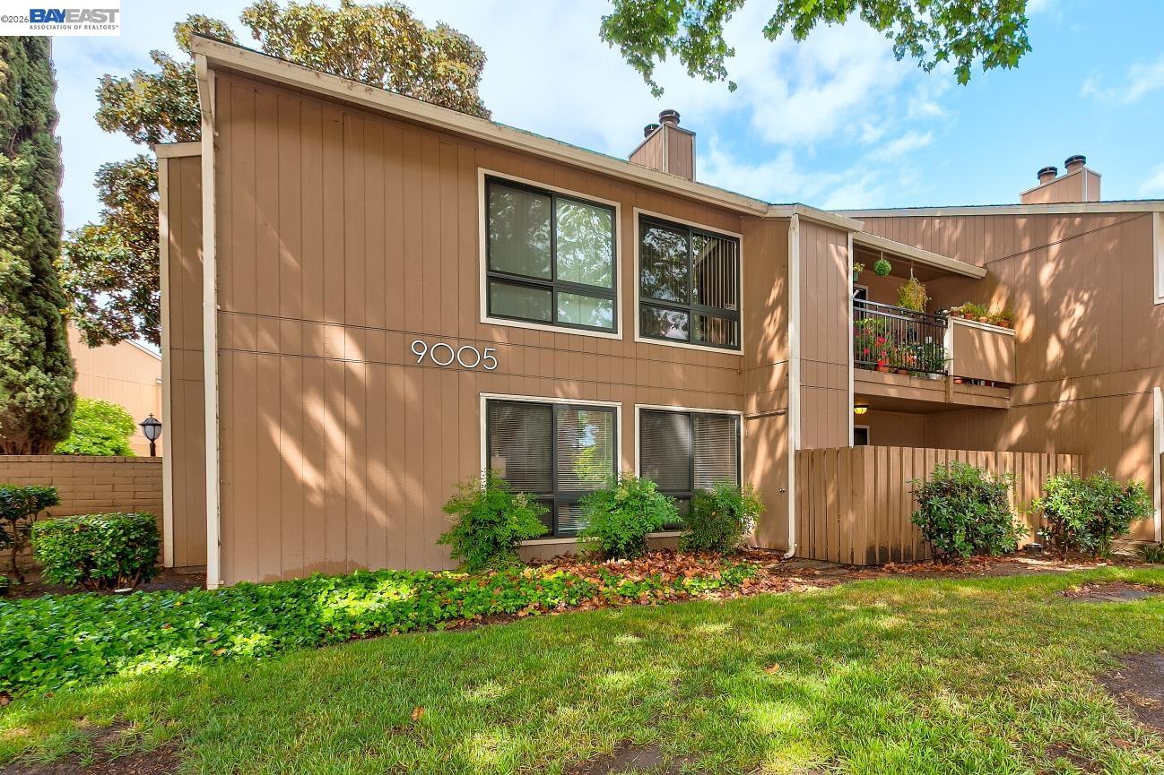 9005 Alcosta Boulevard, Unit 199 San Ramon, CA 94583 - Photo 3 of 57 a view of a house with brick walls and a yard with plants
