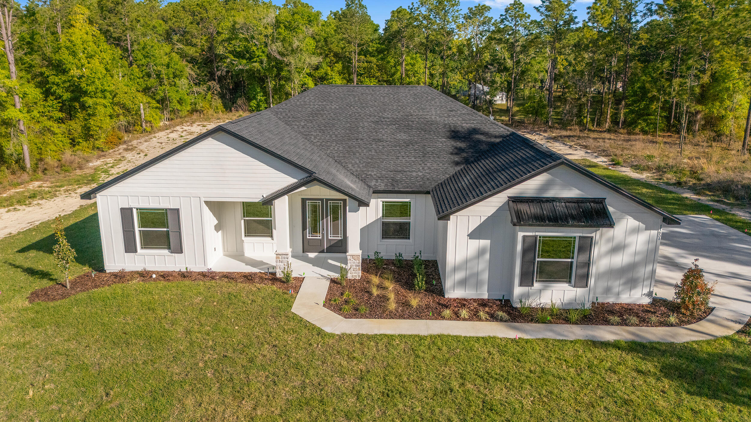 11651 Southwest 43rd Street Road Ocala, FL 34474 - Photo 6 of 66 DJI_20231128091739_0002_D