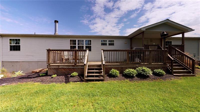 346 Hutchman Road Mars, PA 16046 - Photo 4 of 25 View of the Expansive Back Deck that is Partially Covered! Perfect for Entertaining!This home has amazing Landscaping!
