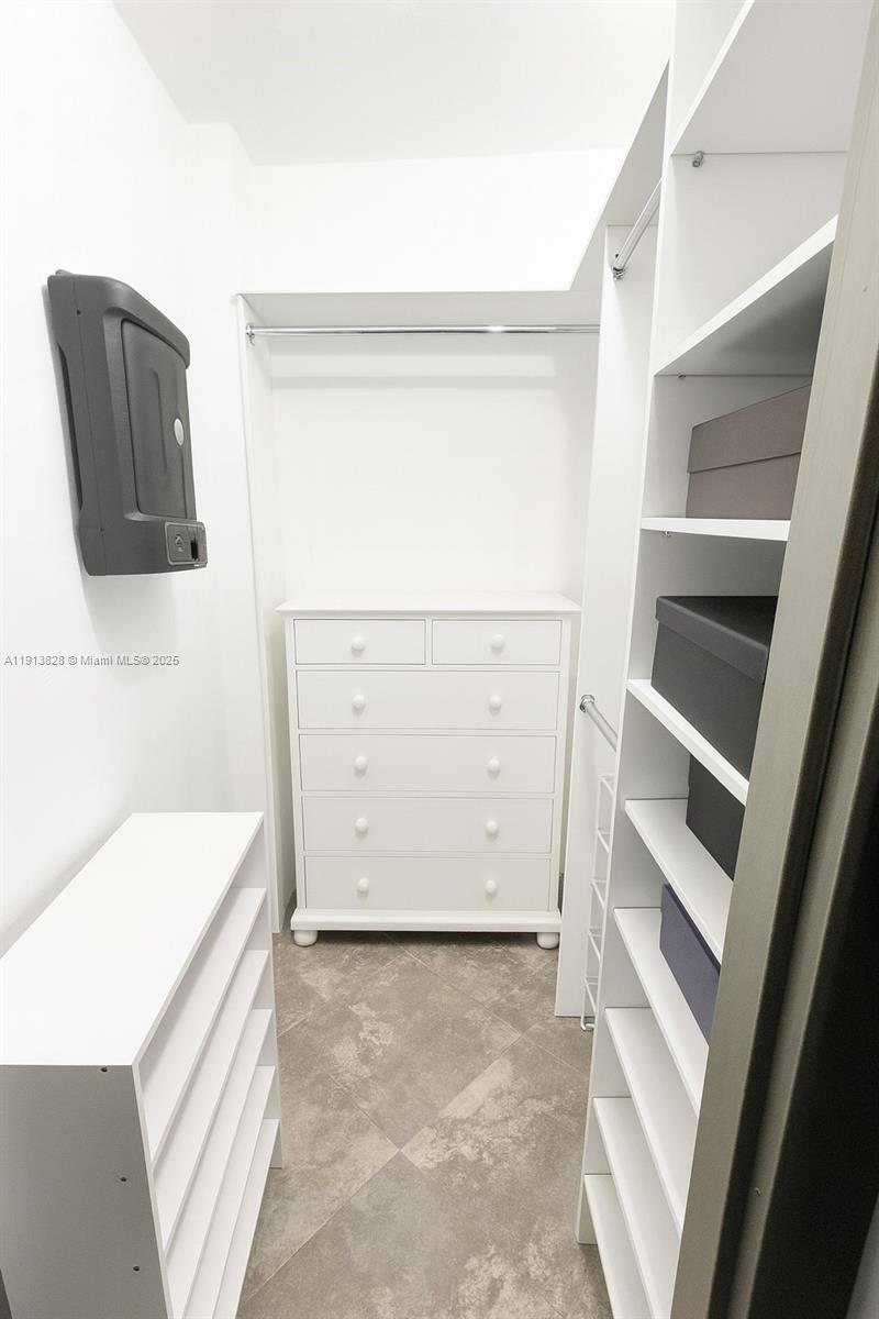 1300 Lincoln Road, Unit A301 Miami Beach, FL 33139 - Photo 12 of 13 a view of walk in closet