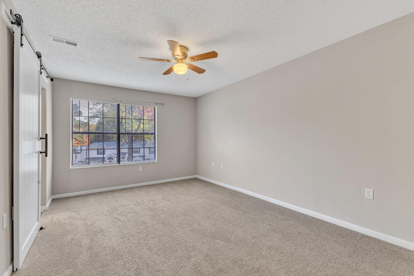 2430 Condor Court Raleigh, NC 27615 - Photo 17 of 34 a view of an empty room with a window