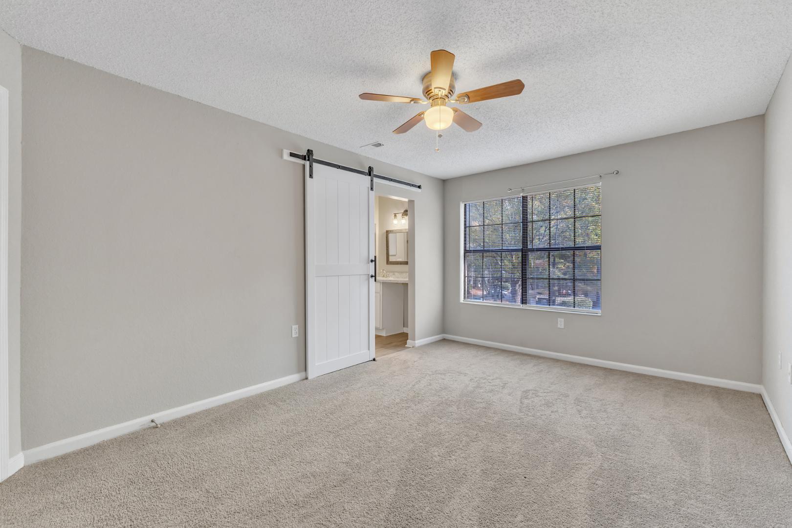 2430 Condor Court Raleigh, NC 27615 - Photo 18 of 34 a view of an empty room with a window