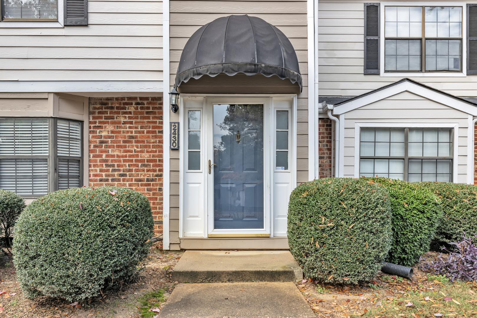 2430 Condor Court Raleigh, NC 27615 - Photo 2 of 34 a front view of a house with a garden