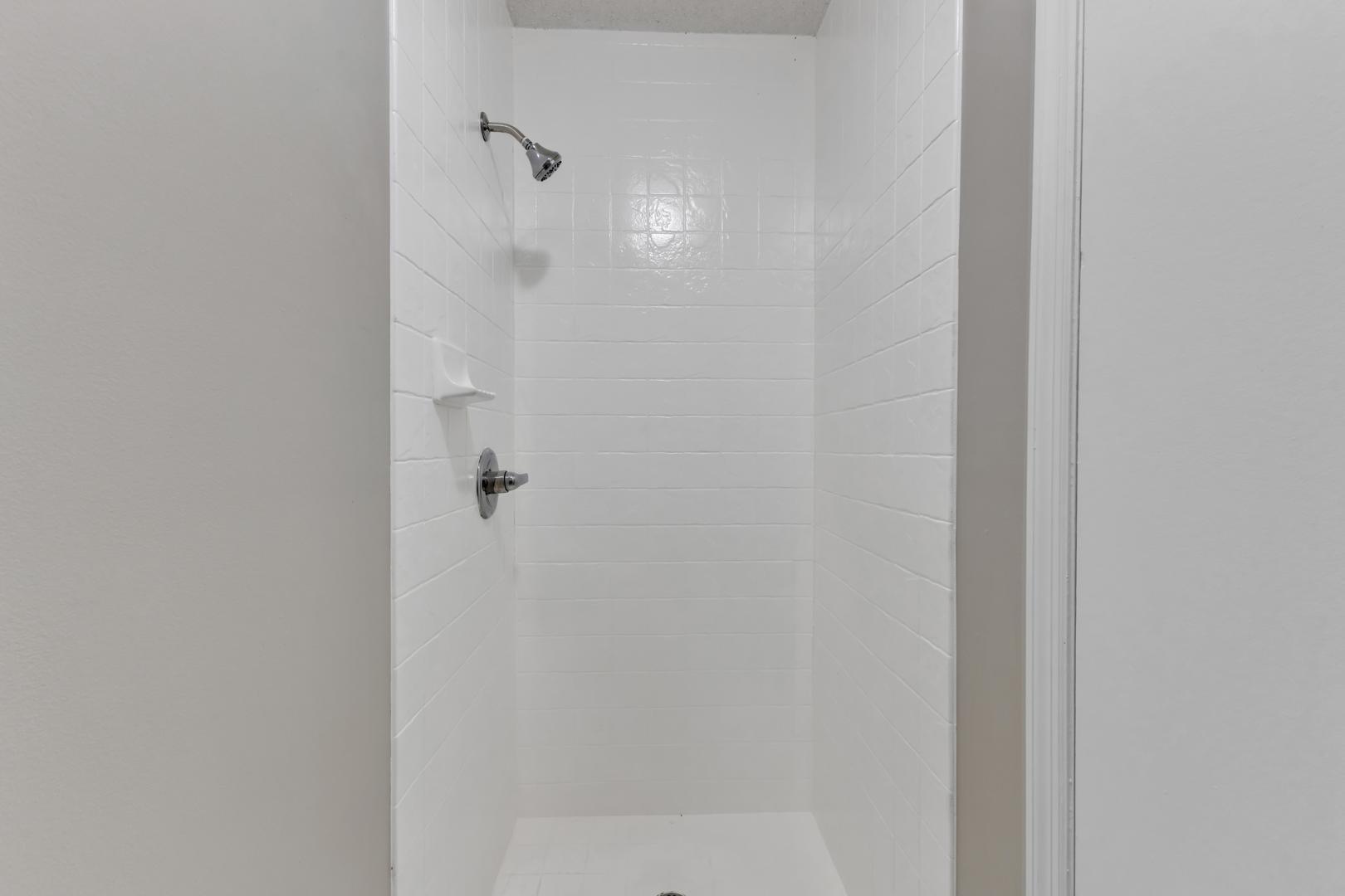 2430 Condor Court Raleigh, NC 27615 - Photo 21 of 34 a bathroom with a shower