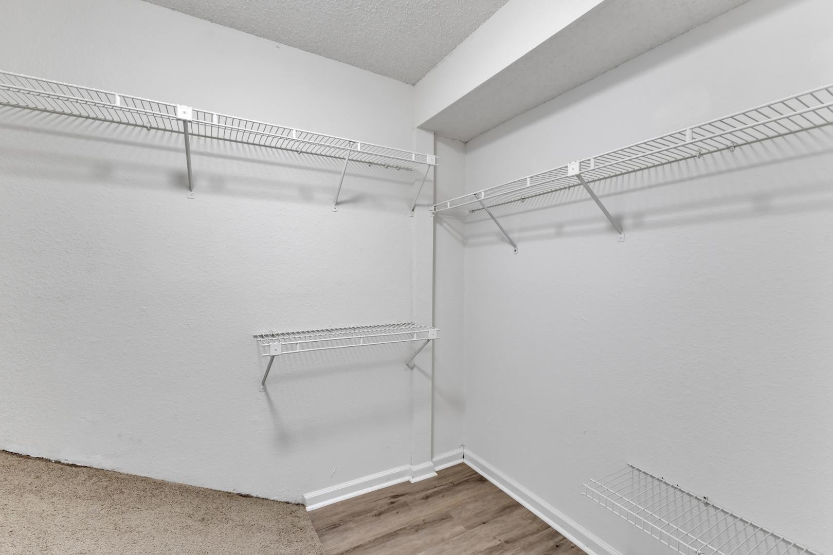 2430 Condor Court Raleigh, NC 27615 - Photo 22 of 34 a view of a room with racks on the wall