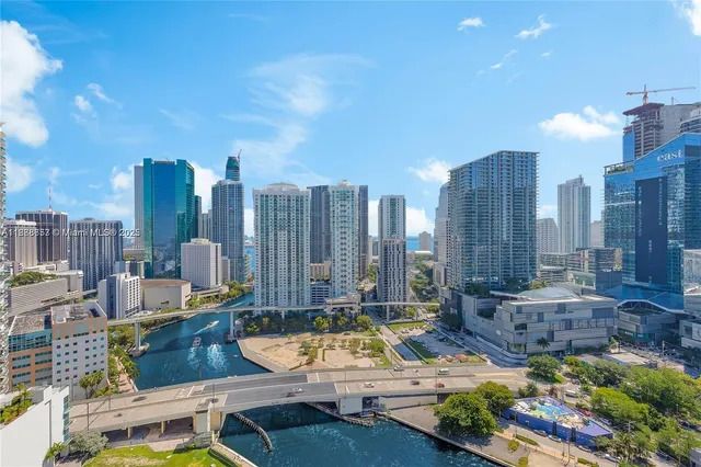 a view of a city with tall buildings