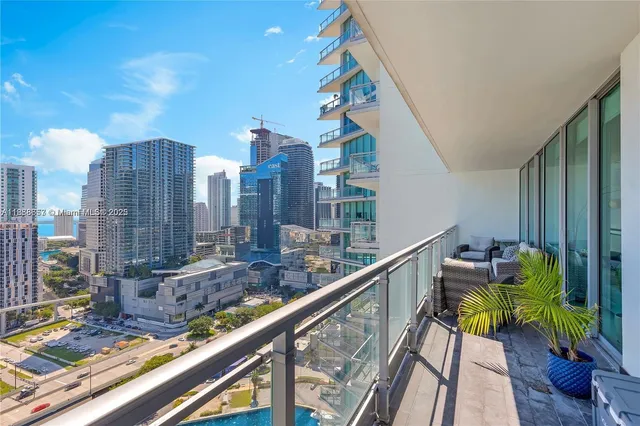 a view of balcony with furniture