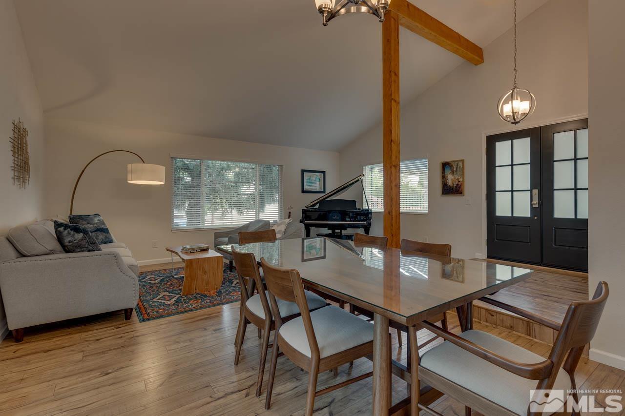 960 Twin Pines Road Reno, NV 89509 - Photo 7 of 26 a view of a dining room with furniture and wooden floor