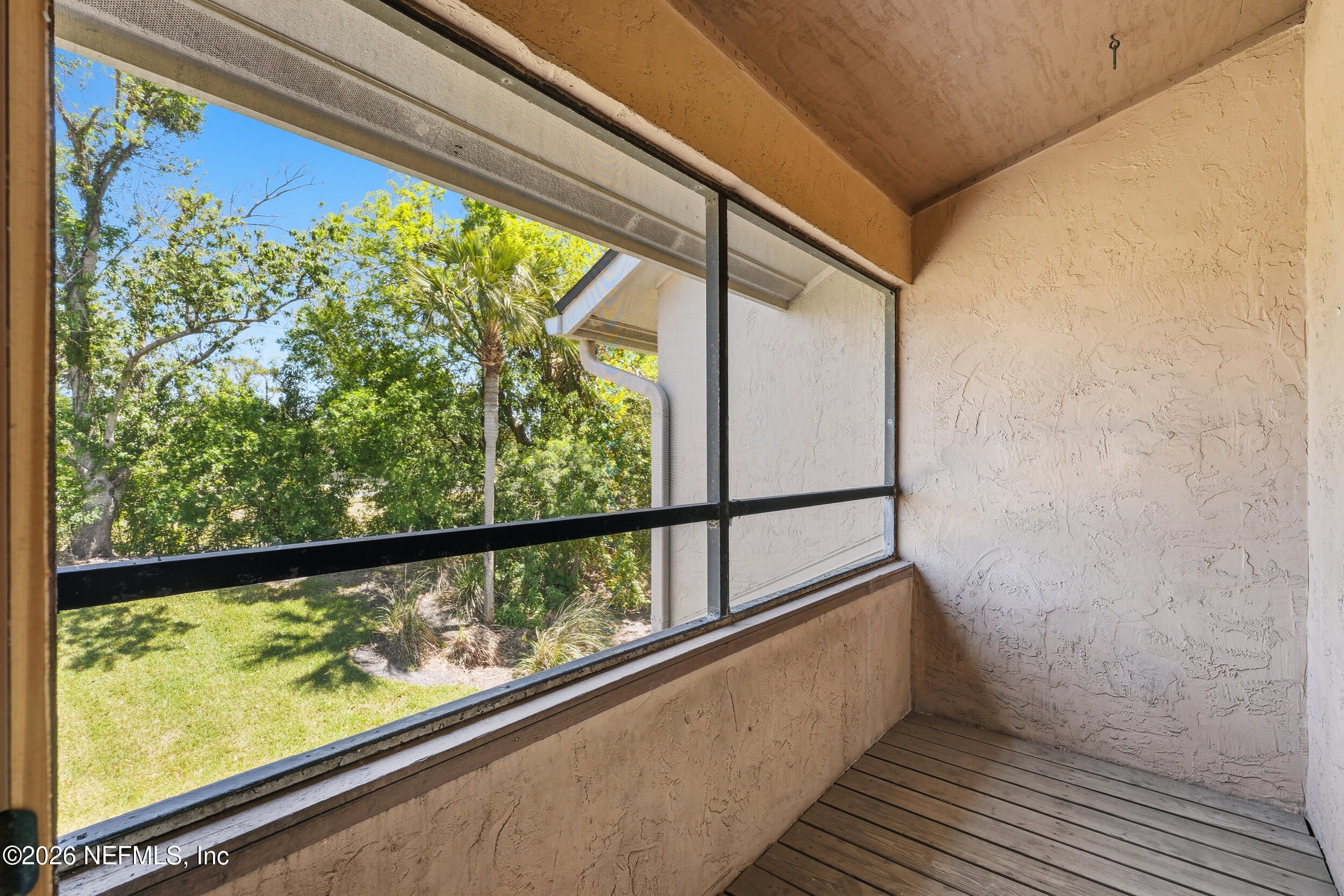 504 Tournament Road Ponte Vedra Beach, FL 32082 - Photo 8 of 52 Screened deck off Kitchen