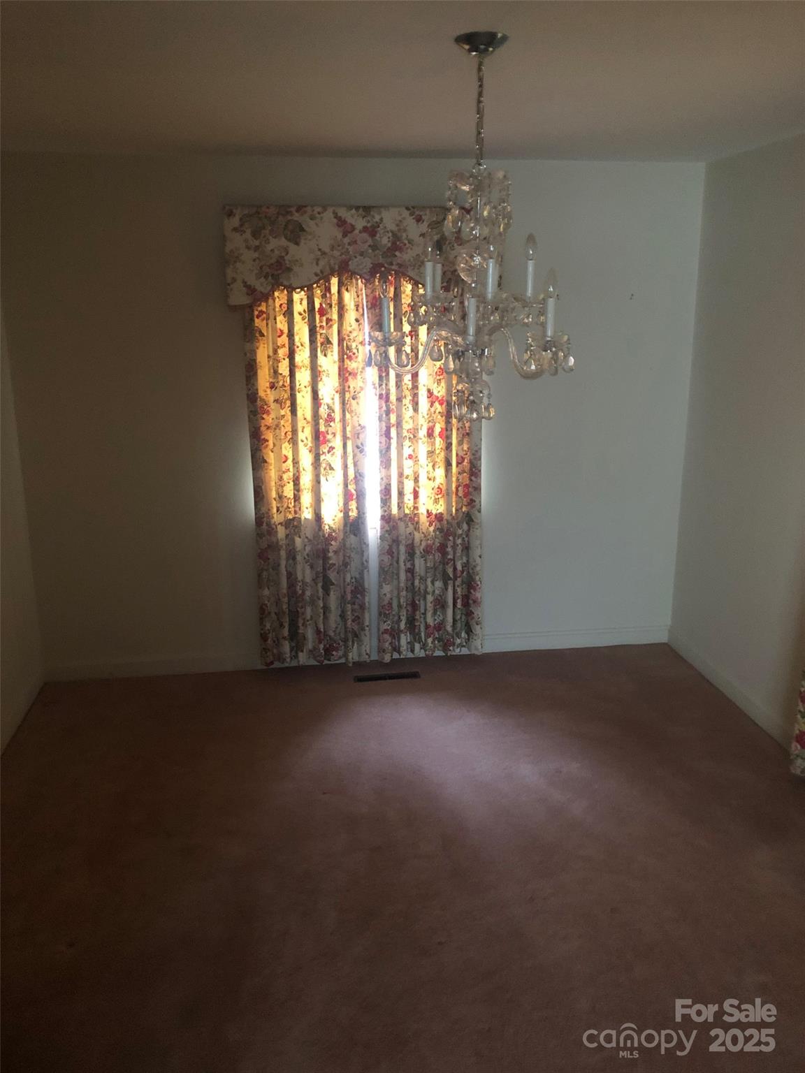 1575 Highway 220 Biscoe, NC 27209 - Photo 3 of 17 an empty room with windows and entrance