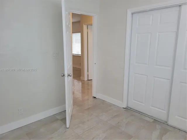 a view of staircase with a rug