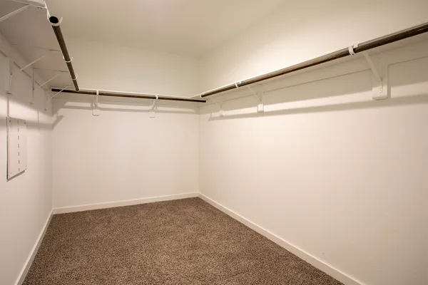 a view of a room with racks on the wall