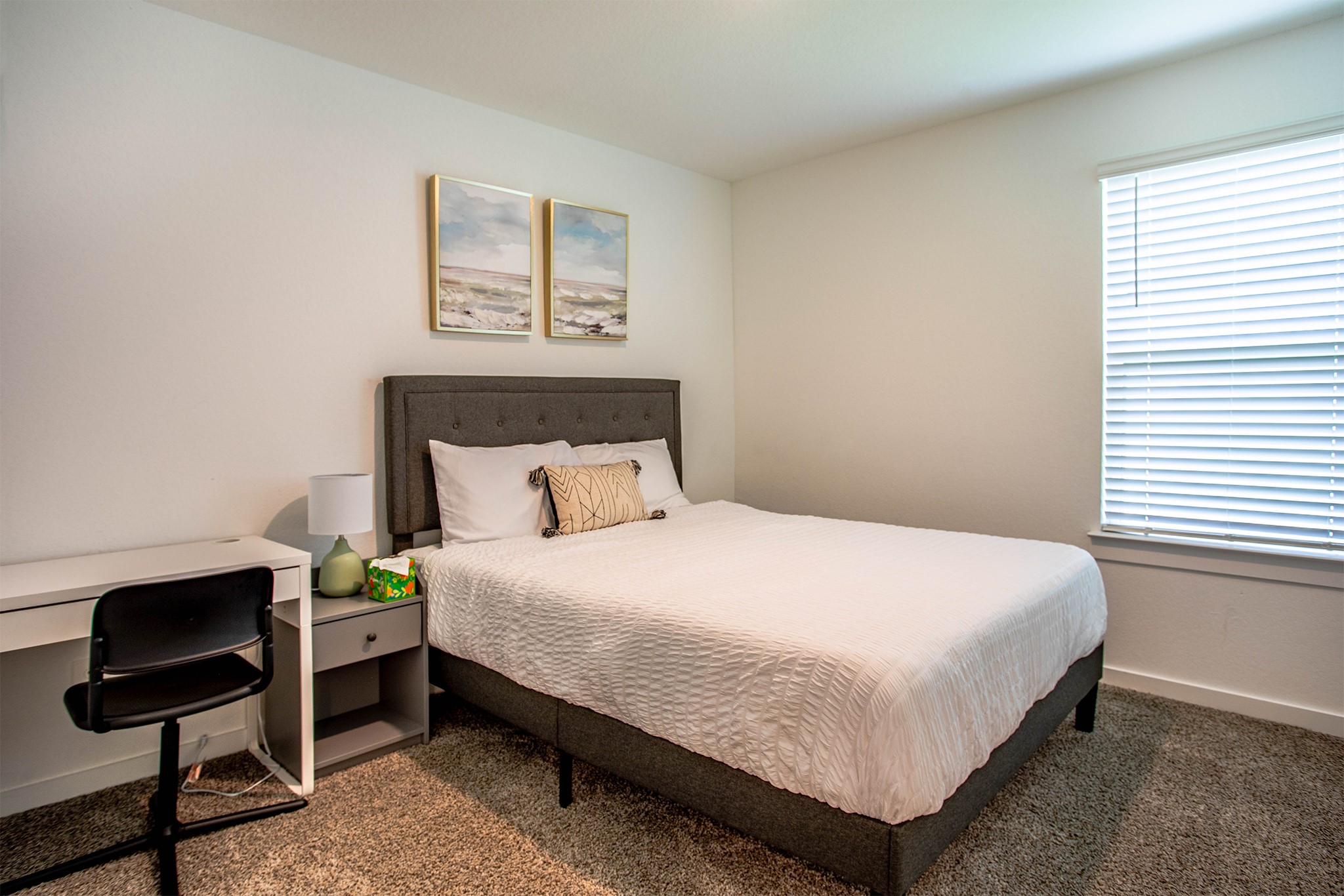 31810 Whittis Hill Way Fulshear, TX 77441 - Photo 16 of 23 This large inviting secondary bedroom is light-filled and spacious, featuring plush carpeting. A desk and nightstand add functional convenience.