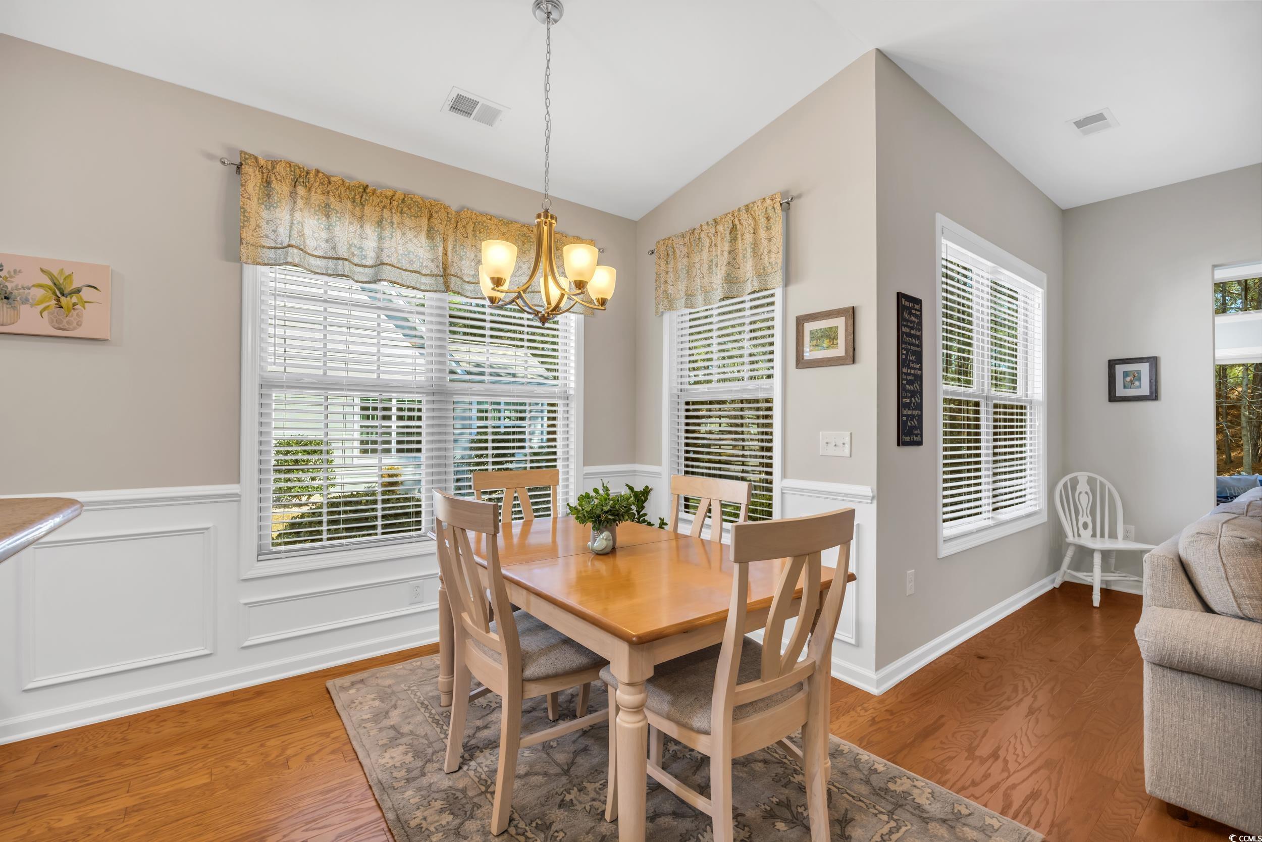 110 Summerlight Drive Murrells Inlet, SC 29576 - Photo 15 of 40 Dining space featuring lofted ceiling, hardwood /