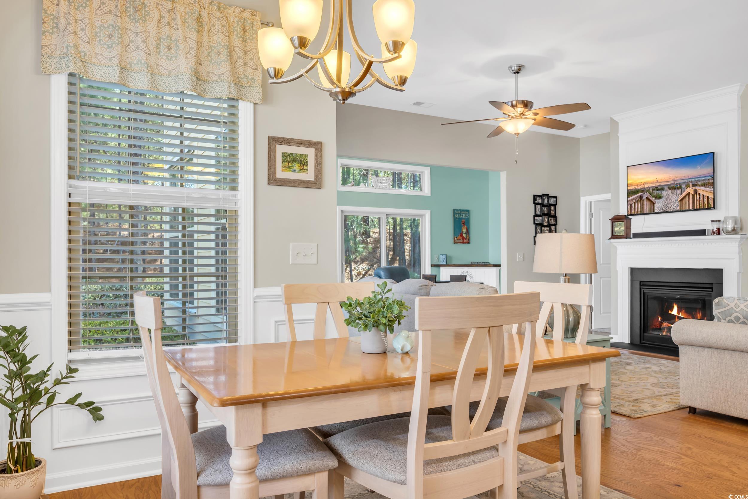 110 Summerlight Drive Murrells Inlet, SC 29576 - Photo 17 of 40 Dining space with ceiling fan and wood-type floori