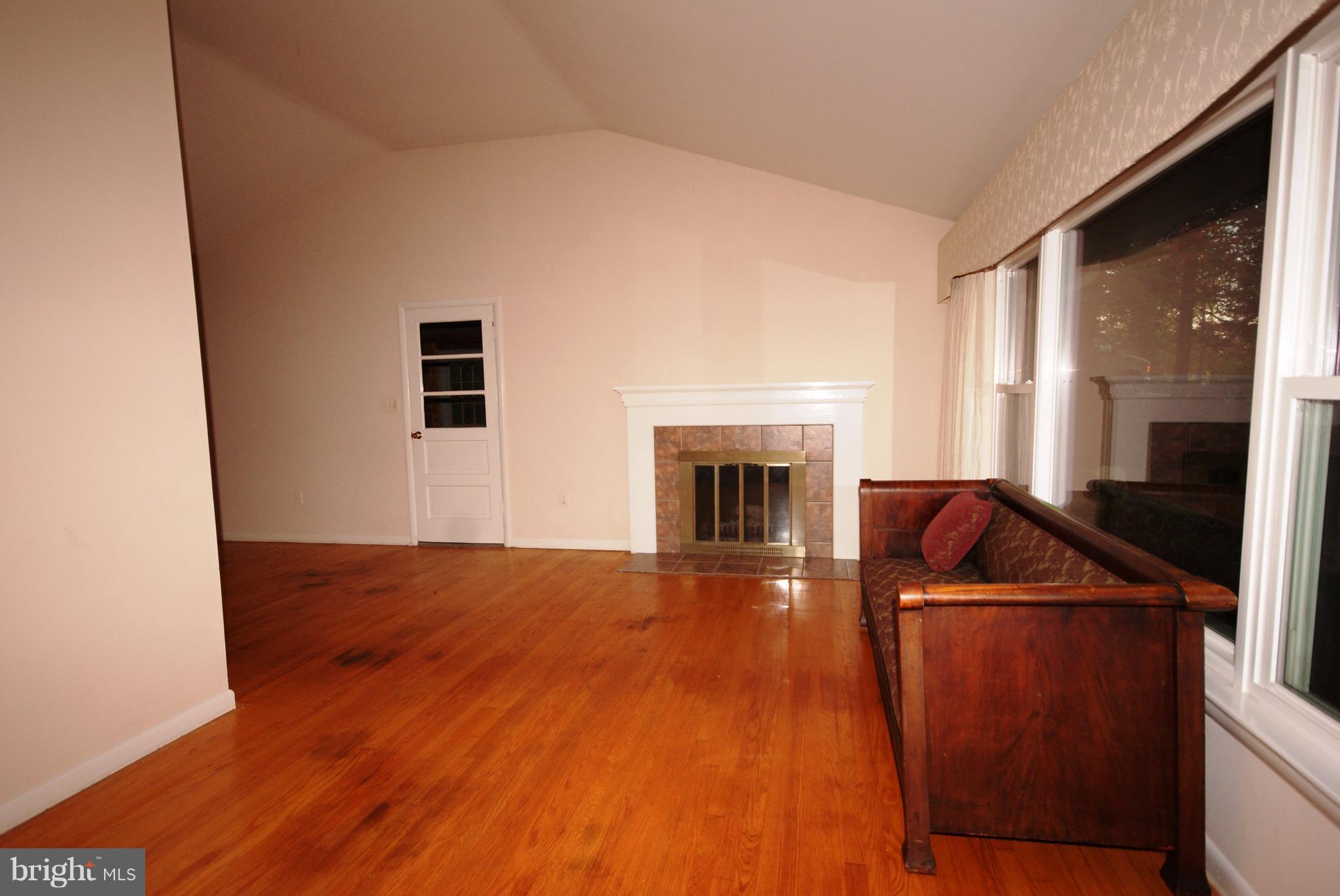 22709 Frederick Road Clarksburg, MD 20871 - Photo 2 of 18 Living Room after carpeting removed