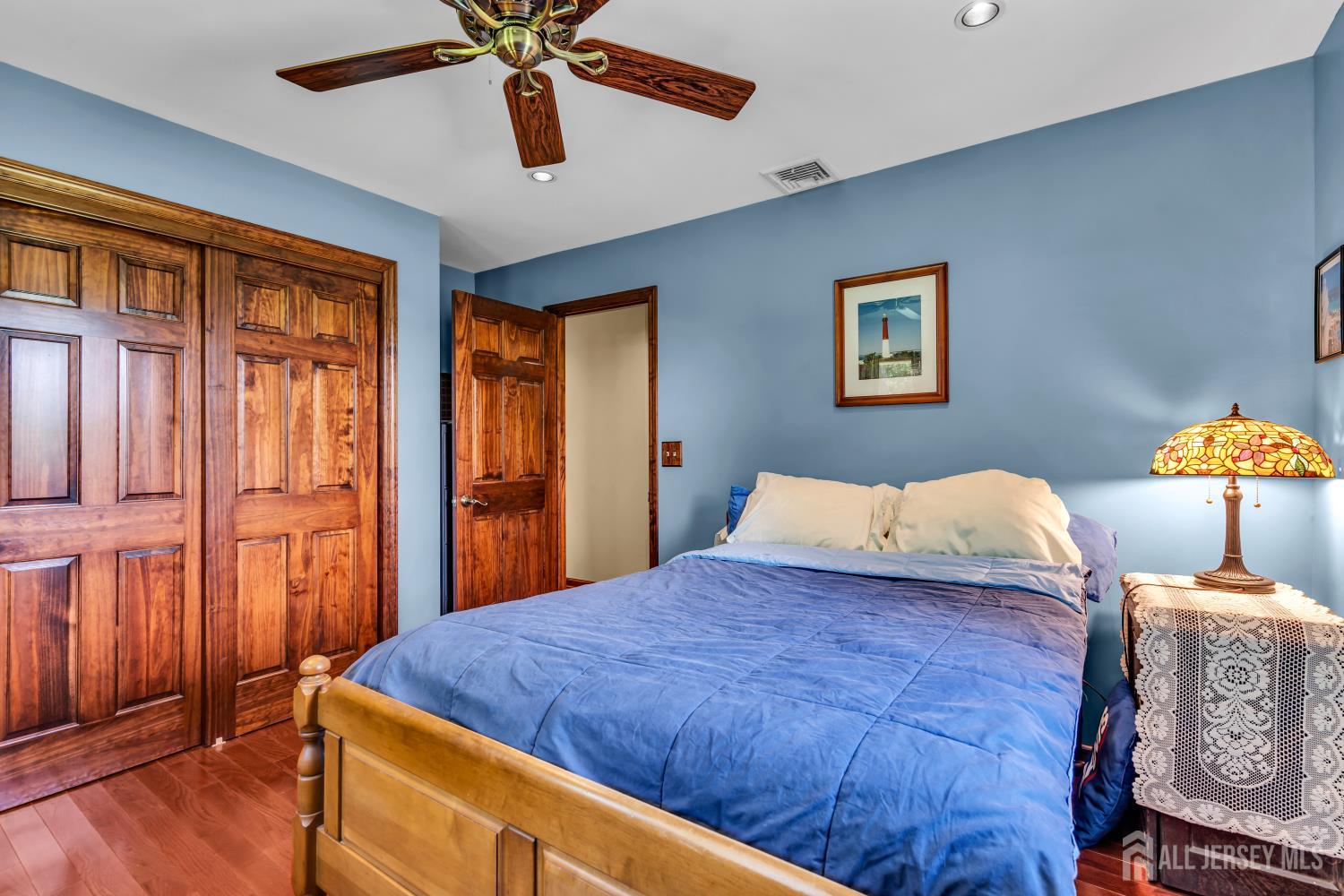99 Schulmeister Road Old Bridge, NJ 08857 - Photo 15 of 49 a bed sitting in a bedroom next to a window