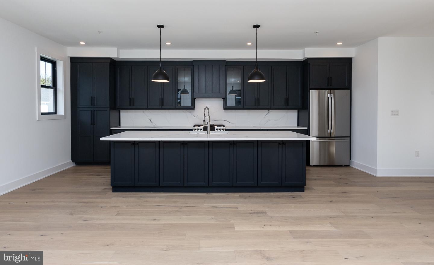 981 Henry Avenue Wayne, PA 19087 - Photo 21 of 32 Sleek modern kitchen with elegance.