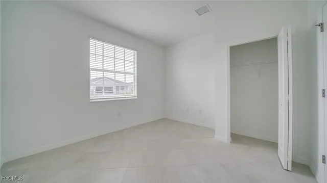 an empty room with a window