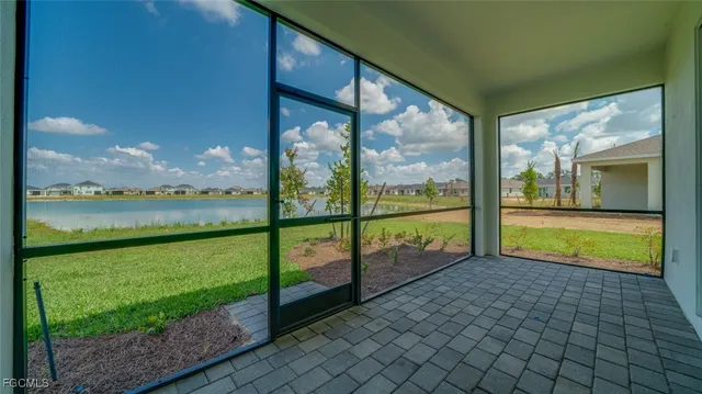 a view of swimming pool with a yard