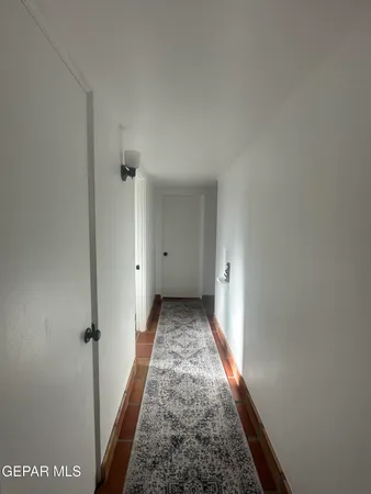 a bathroom with a shower and a sink