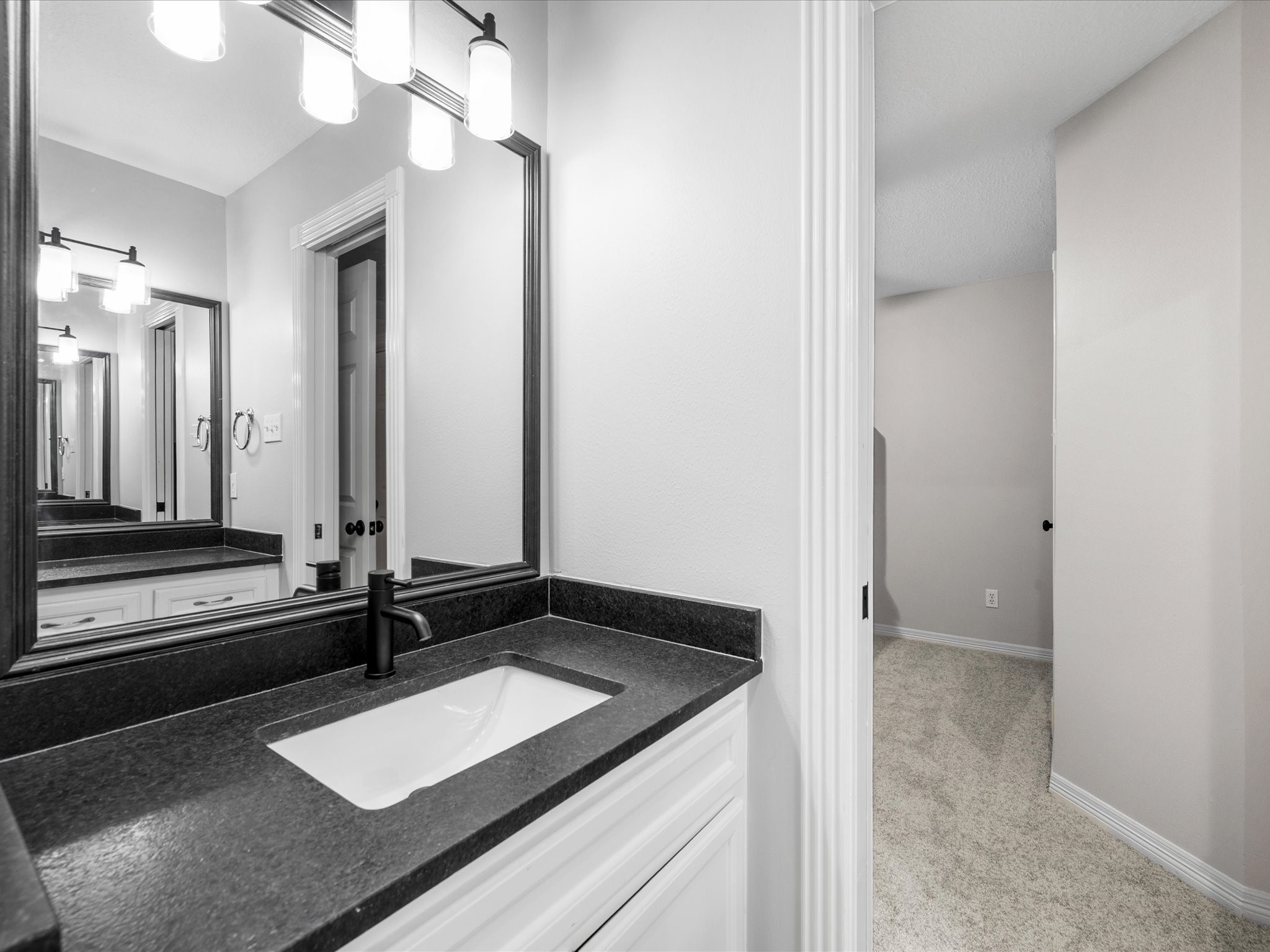 5910 Center Ct Drive Spring, TX 77379 - Photo 32 of 50 The updated bathroom features refreshed finishes and a clean, modern design that aligns with the home’s comprehensive renovation throughout.