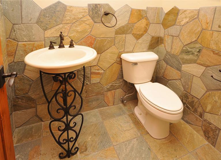 50 Elk Spring Court Edwards, CO 81632 - Photo 13 of 25 a bathroom with a toilet sink and mirror