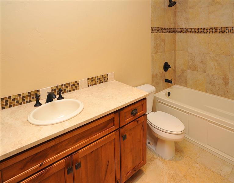 50 Elk Spring Court Edwards, CO 81632 - Photo 23 of 25 a bathroom with a sink a toilet and shower