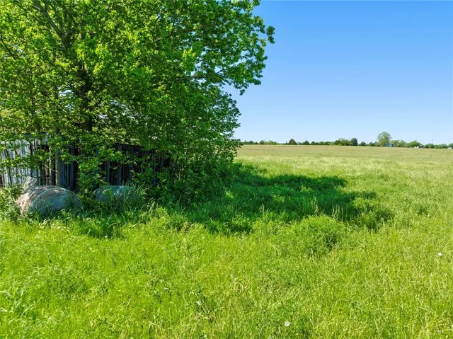 a view of lake with green space