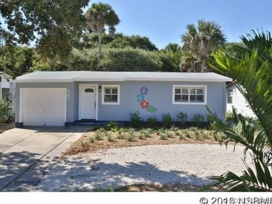 a dining table with chairs and wooden floor