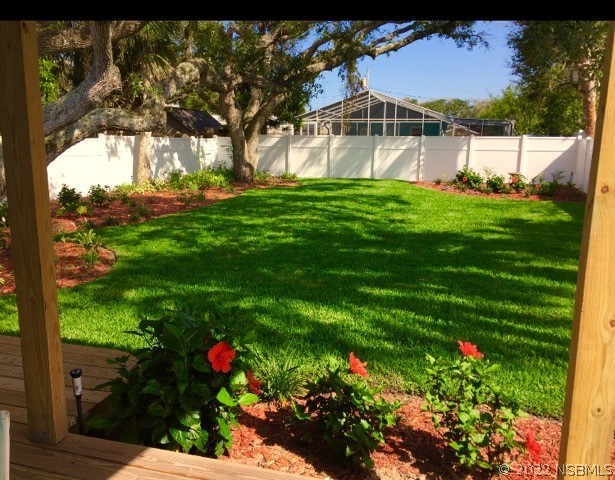 827 11th Avenue New Smyrna Beach, FL 32169 - Photo 20 of 21 a view of a house with a yard