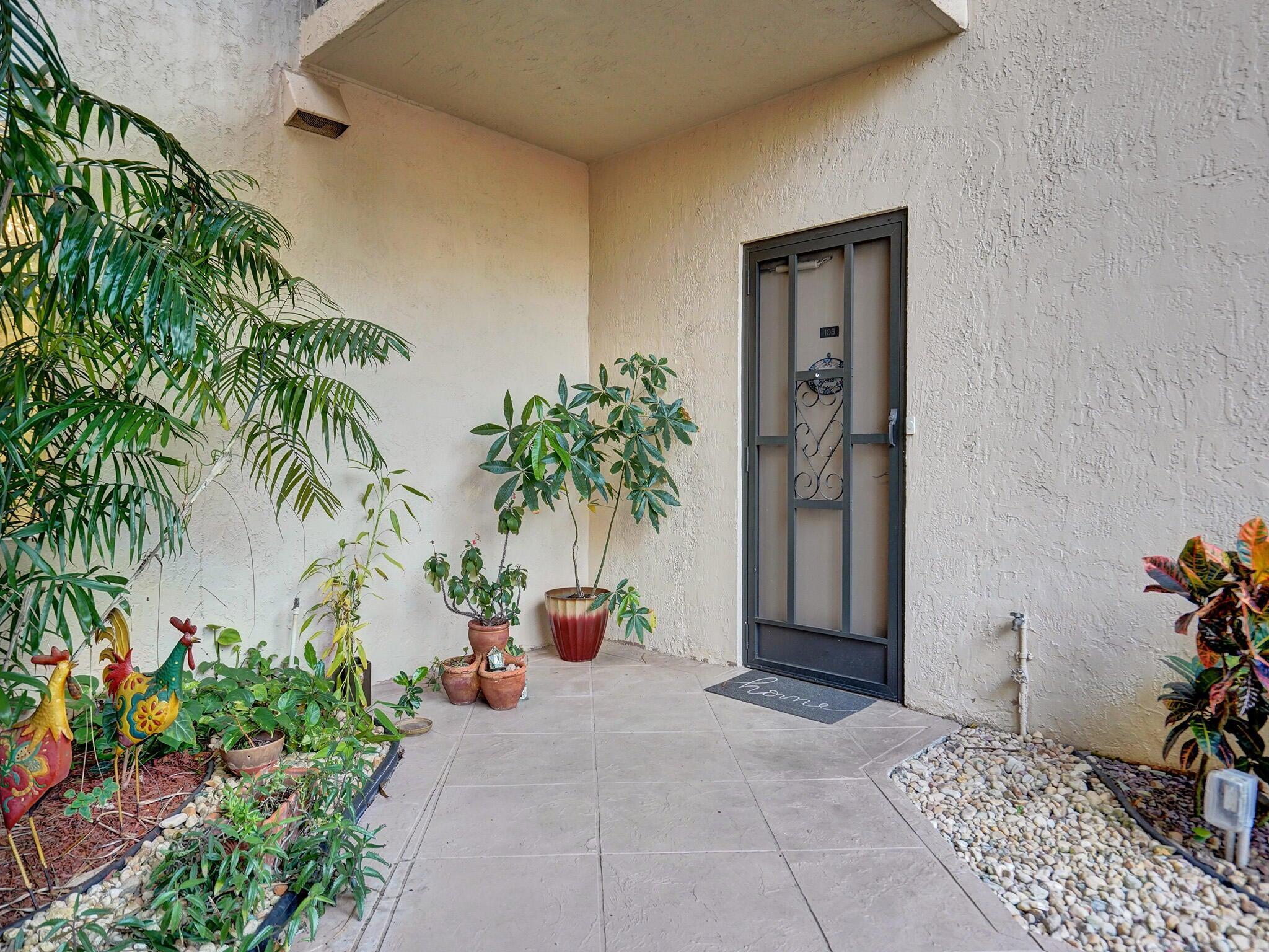 7546 La Paz Boulevard, Unit 108 Boca Raton, FL 33433 - Photo 2 of 33 Front entry door to the unit