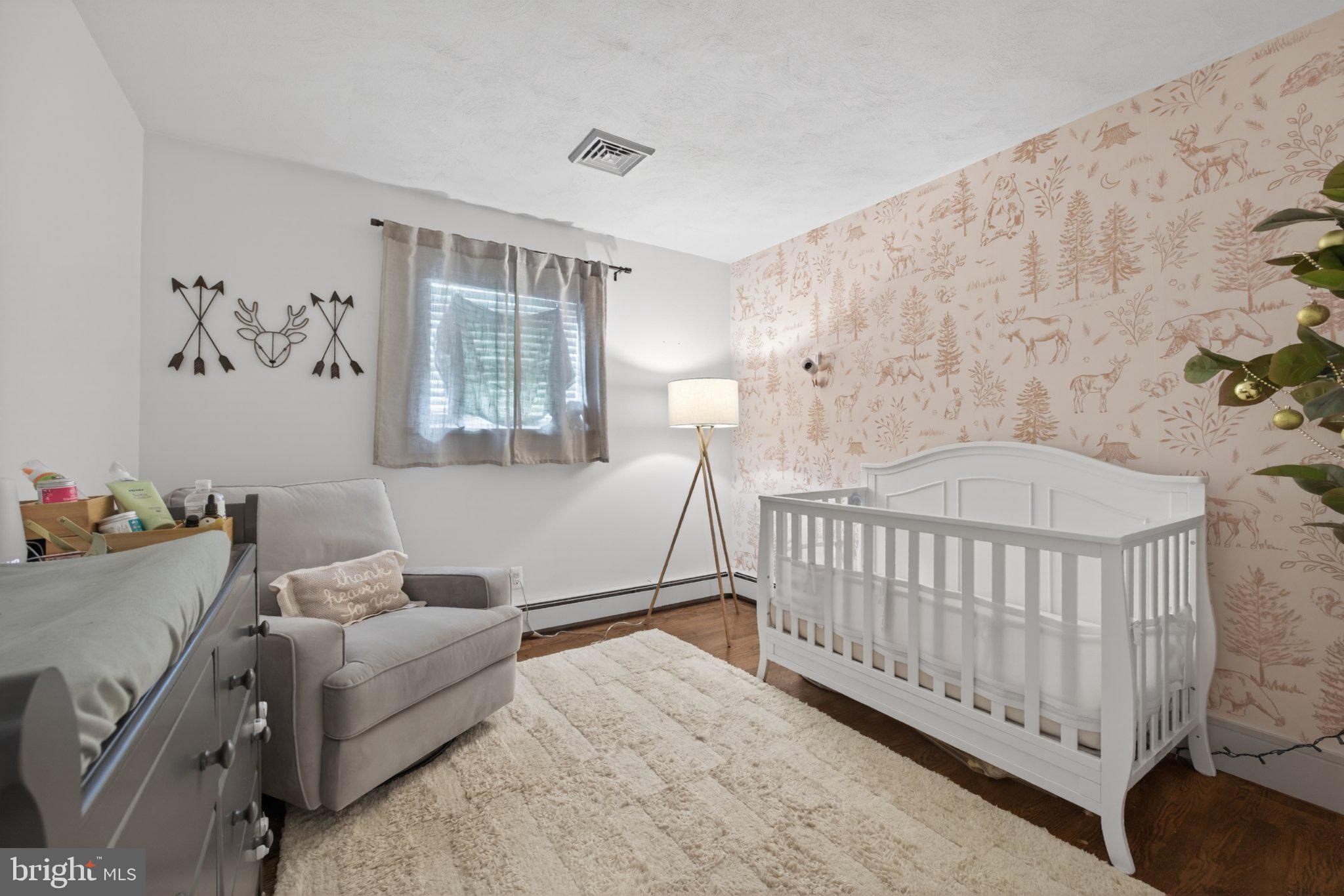 30 Merrin Road York, PA 17402 - Photo 30 of 42 Charming nursery with nature-inspired decor.