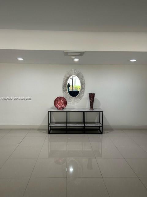 303 Racquet Club Road, Unit 106 Weston, FL 33326 - Photo 19 of 23 a view of a room with cabinets