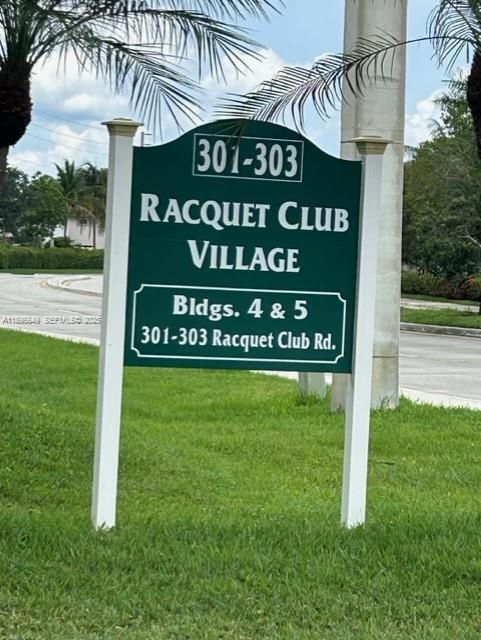 303 Racquet Club Road, Unit 106 Weston, FL 33326 - Photo 20 of 23 a view of a sign board