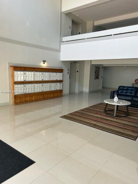 303 Racquet Club Road, Unit 106 Weston, FL 33326 - Photo 21 of 23 a view of kitchen with furniture and window