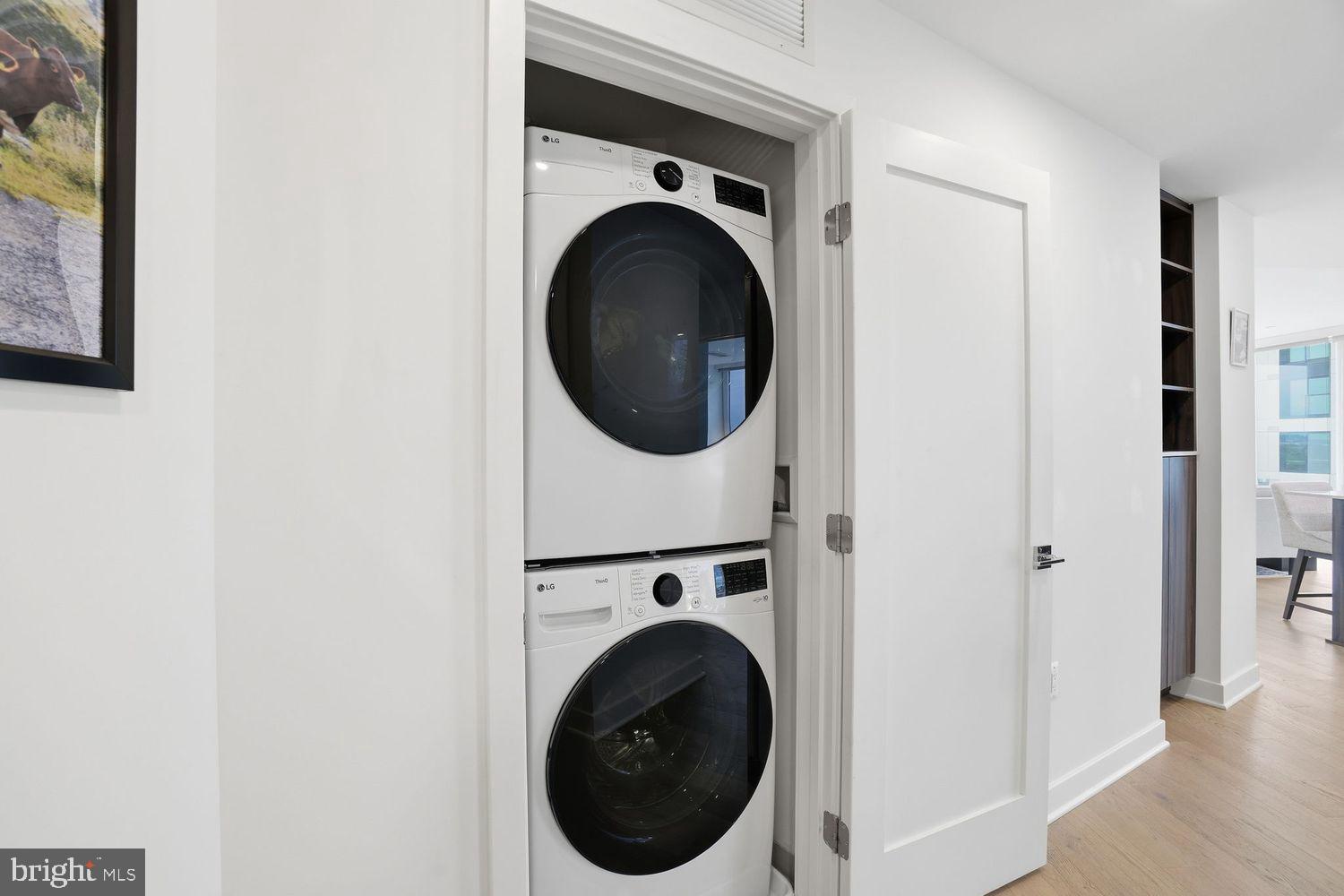 37 L Street Southeast, Unit 902 Washington, DC 20003 - Photo 22 of 43 a close up view of a washer and dryer