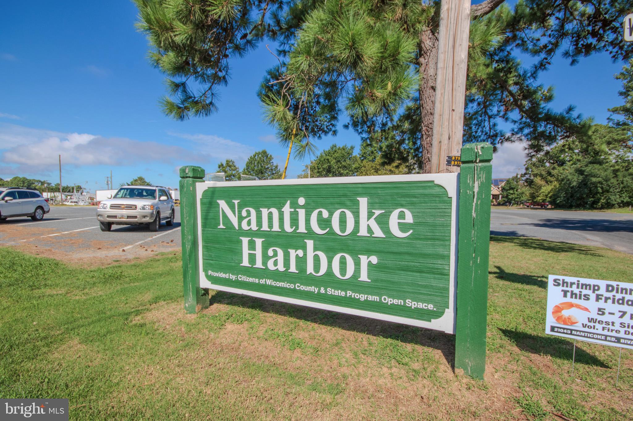 20448 Harbor Road Nanticoke, MD 21840 - Photo 54 of 60 a sign that is on the side of the road