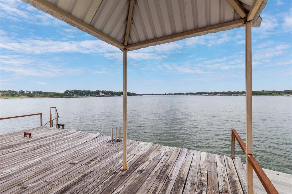 977 Deep Water Road May, TX 76857 - Photo 21 of 36 a view of a lake next to a large bridge