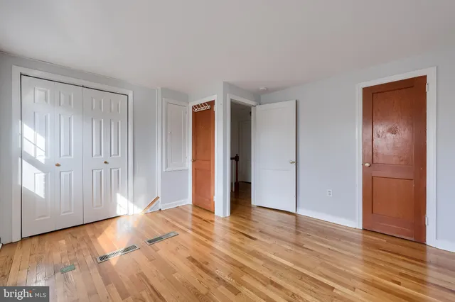 a view of entryway with wooden floor