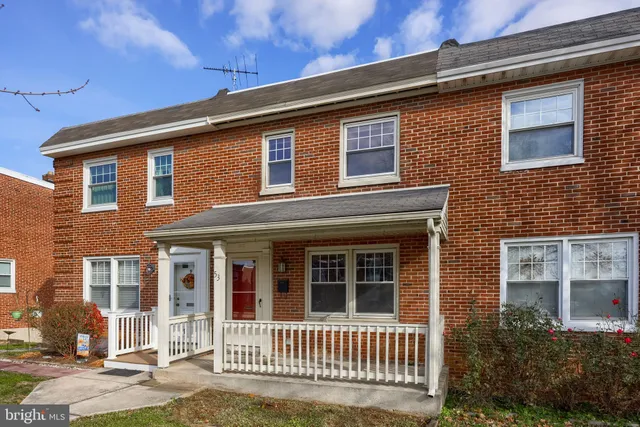 a front view of a house with a glass door