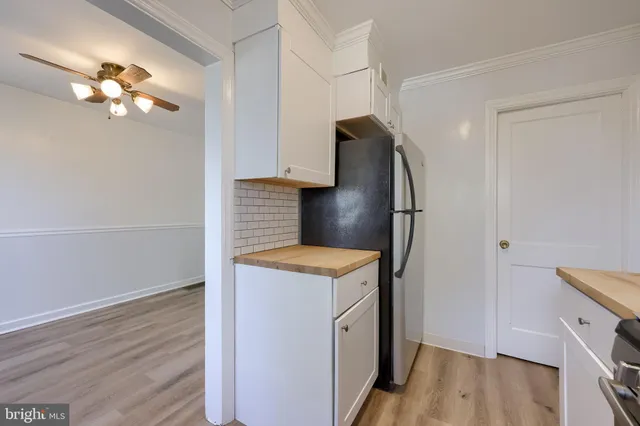 a storage room with wooden floor