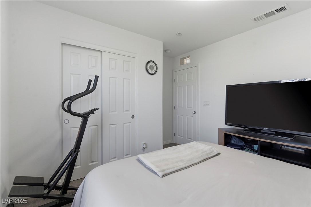4648 Woolcomber Street Las Vegas, NV 89115 - Photo 25 of 41 Bedroom with a closet