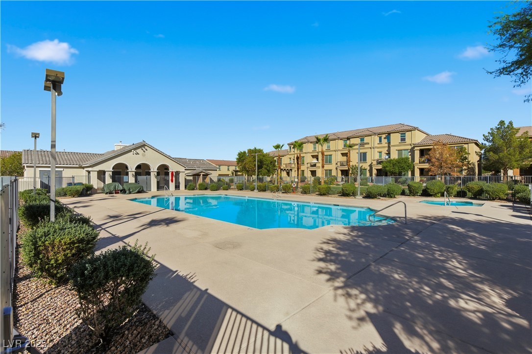 4648 Woolcomber Street Las Vegas, NV 89115 - Photo 36 of 41 Community pool with a patio