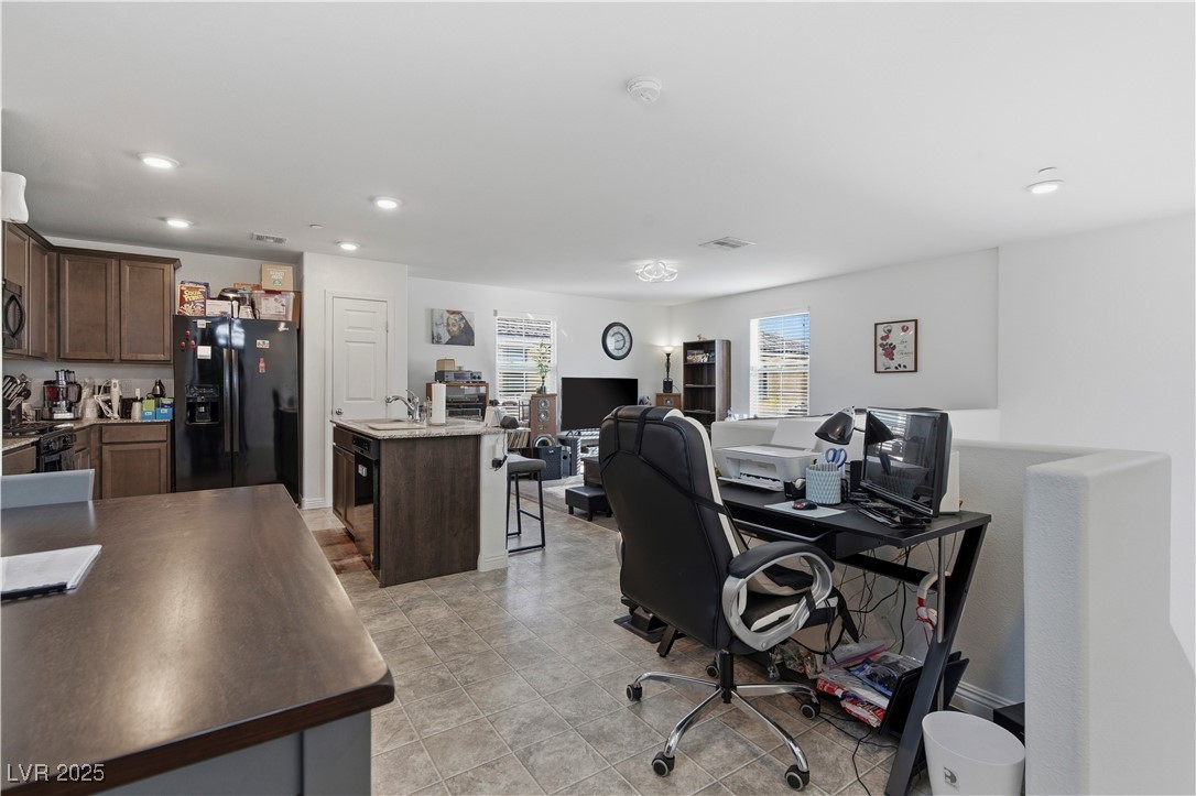 4648 Woolcomber Street Las Vegas, NV 89115 - Photo 6 of 41 Office featuring recessed lighting and a sink